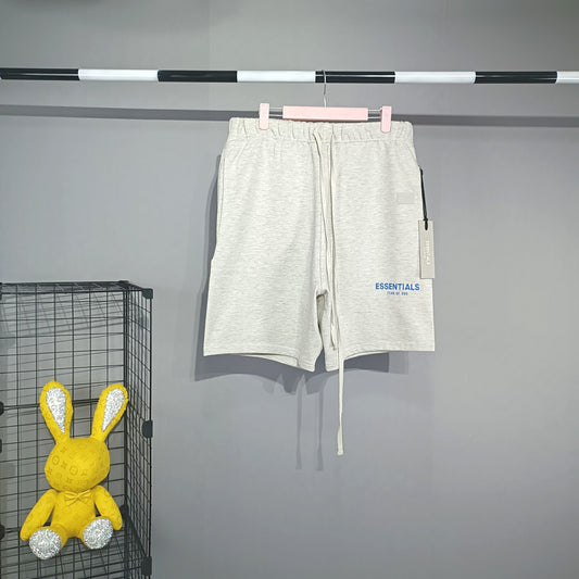 Pantalones cortos blancos y azules