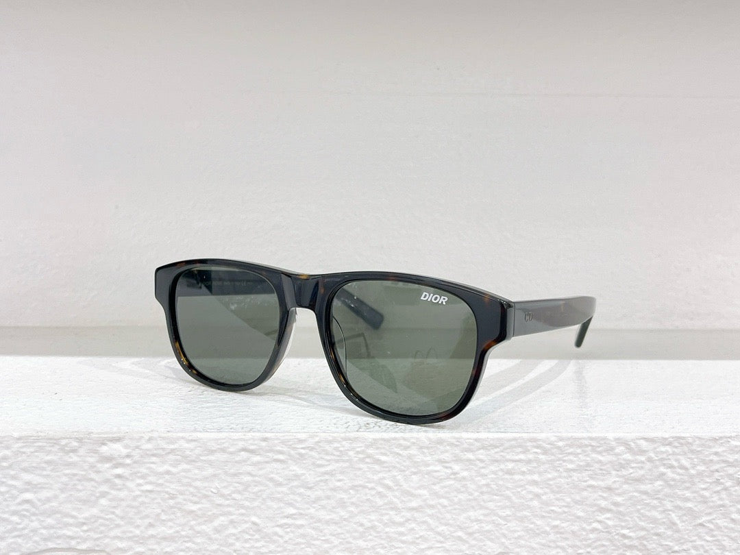 Schwarze, weiße und braune Sonnenbrille