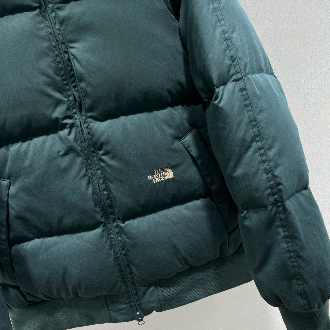 Chaqueta verde, negra y blanca