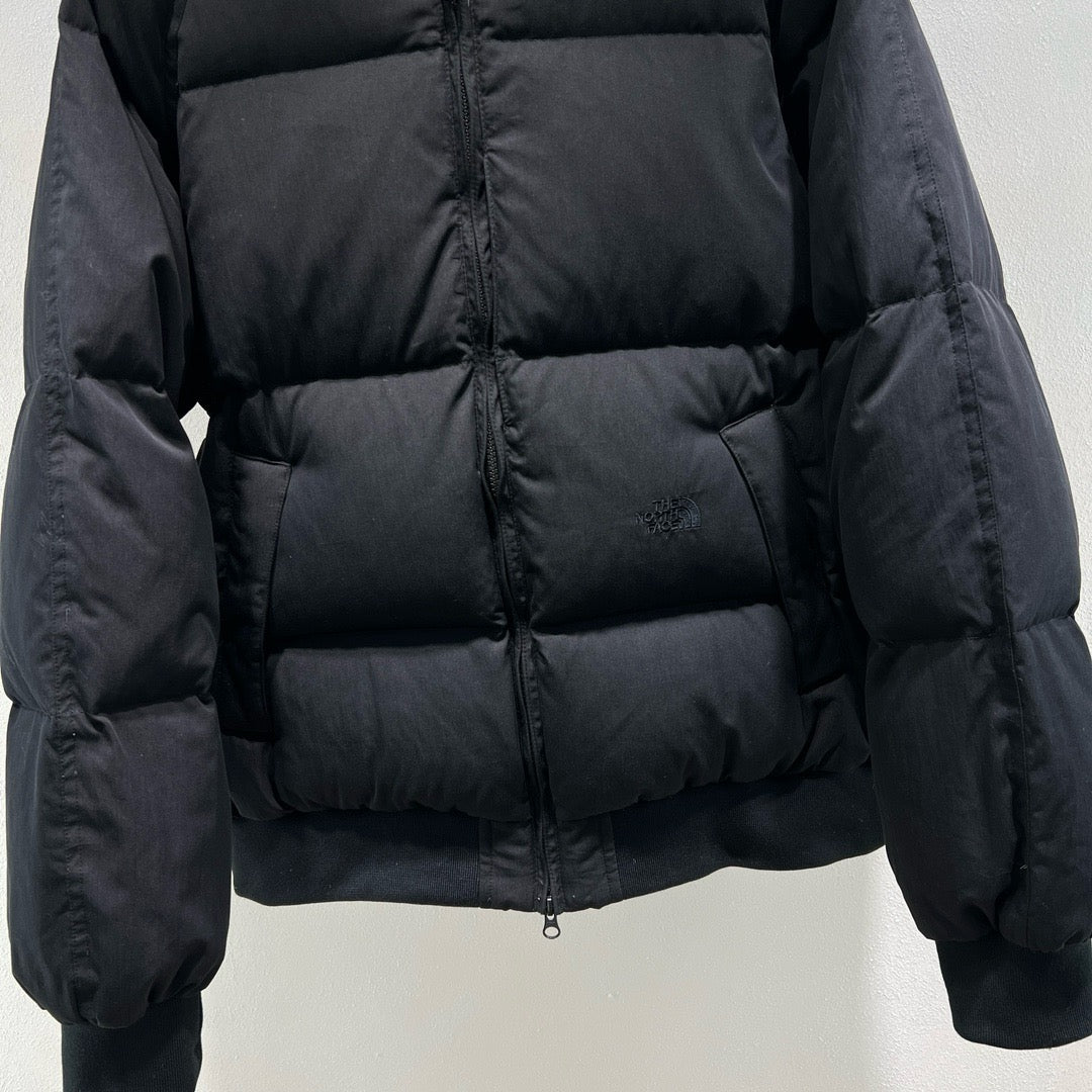Chaqueta verde, negra y blanca