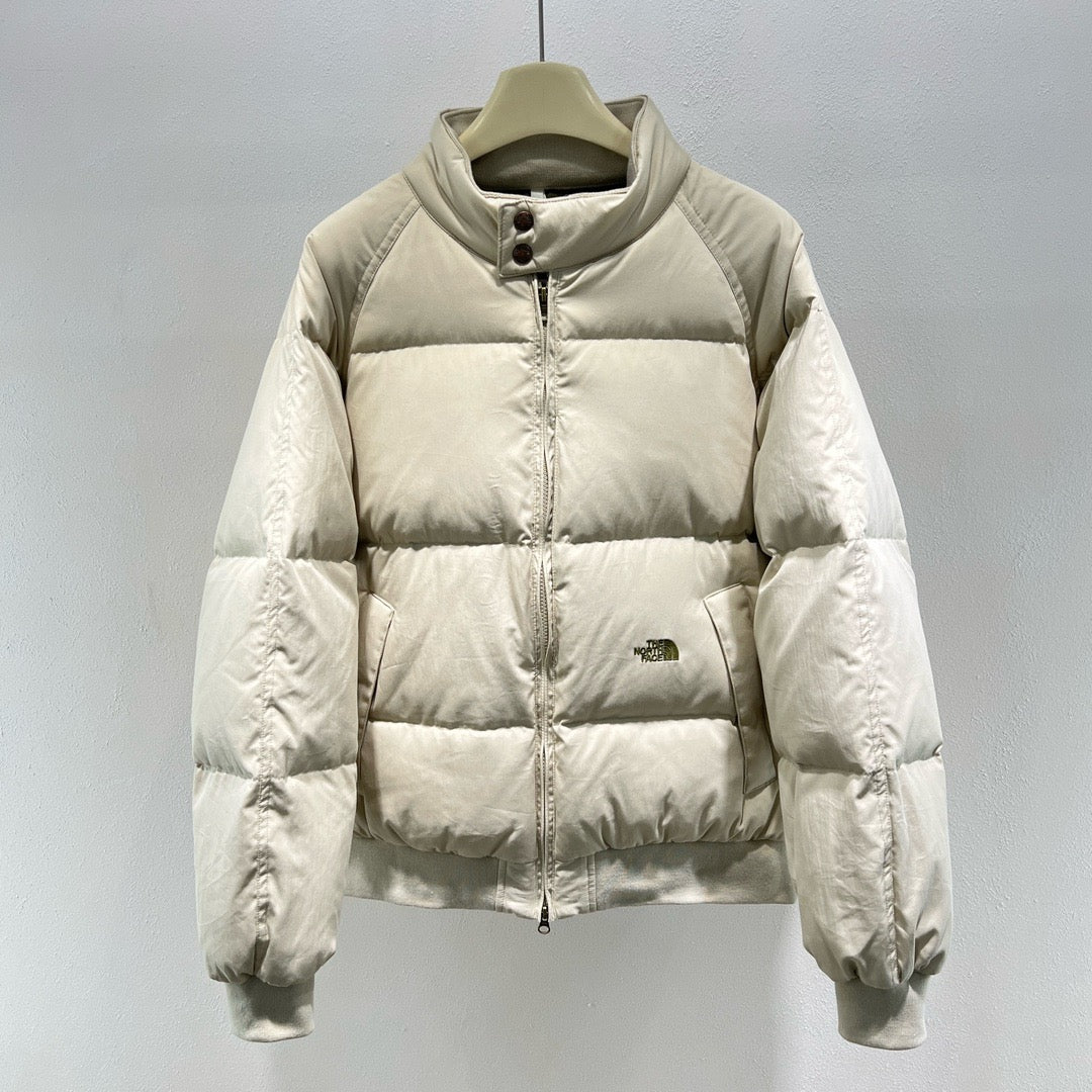 Chaqueta verde, negra y blanca