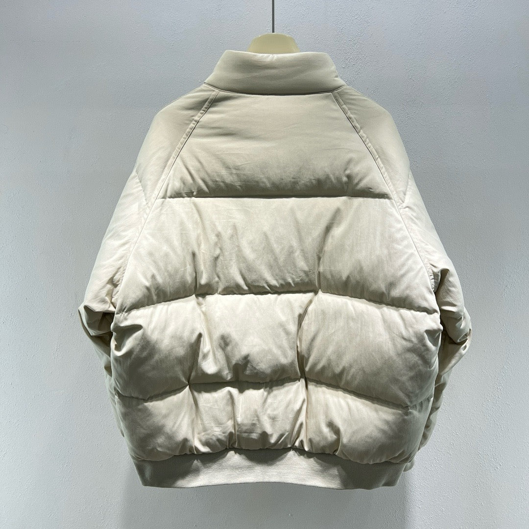 Chaqueta verde, negra y blanca
