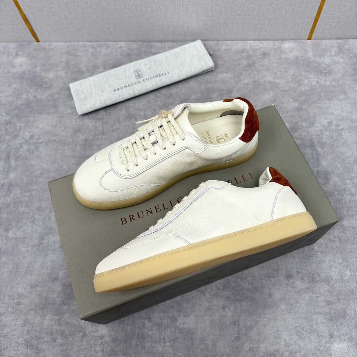 White, Black and Dark Brown Shoes