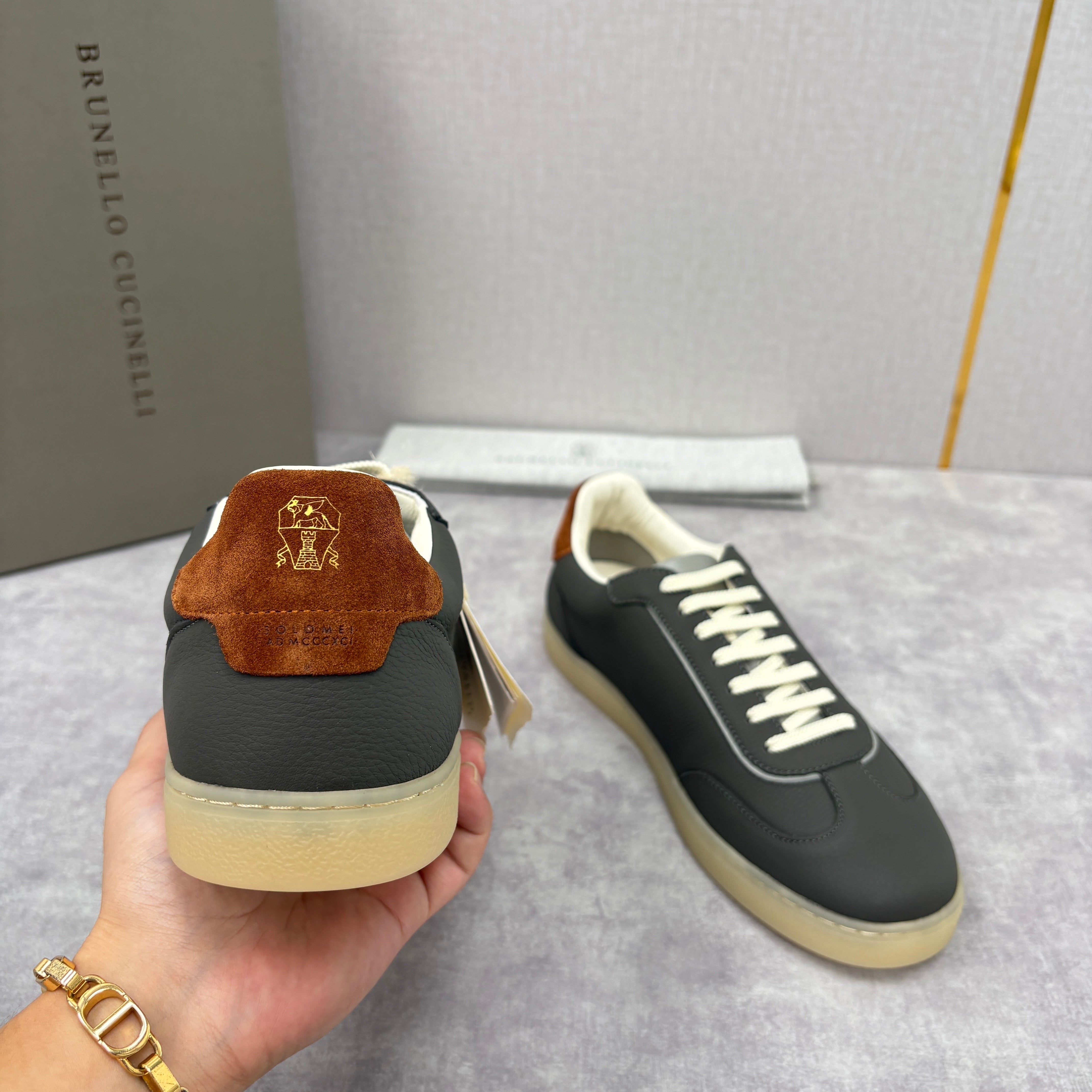 White, Black and Dark Brown Shoes