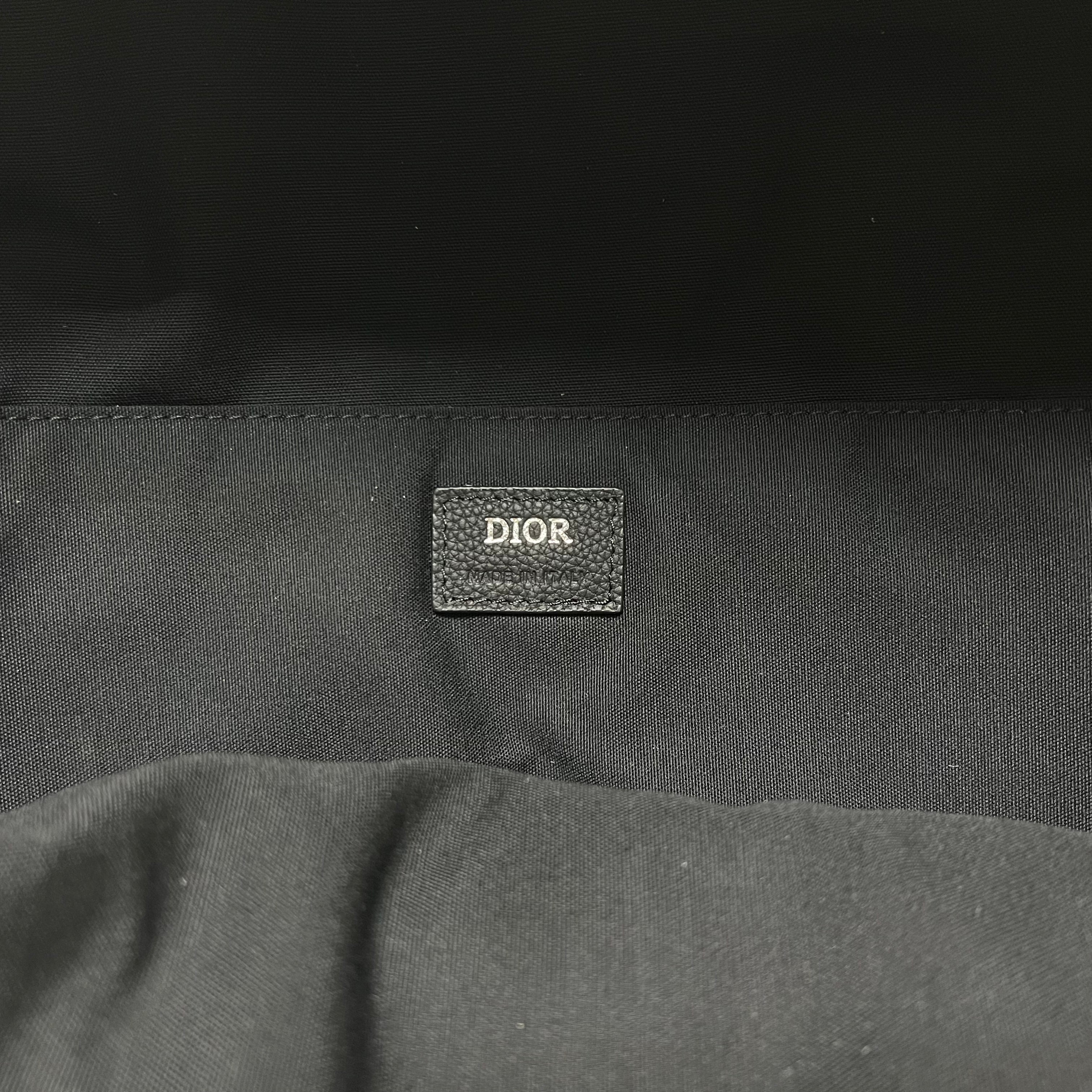 Bolsa azul y gris negra