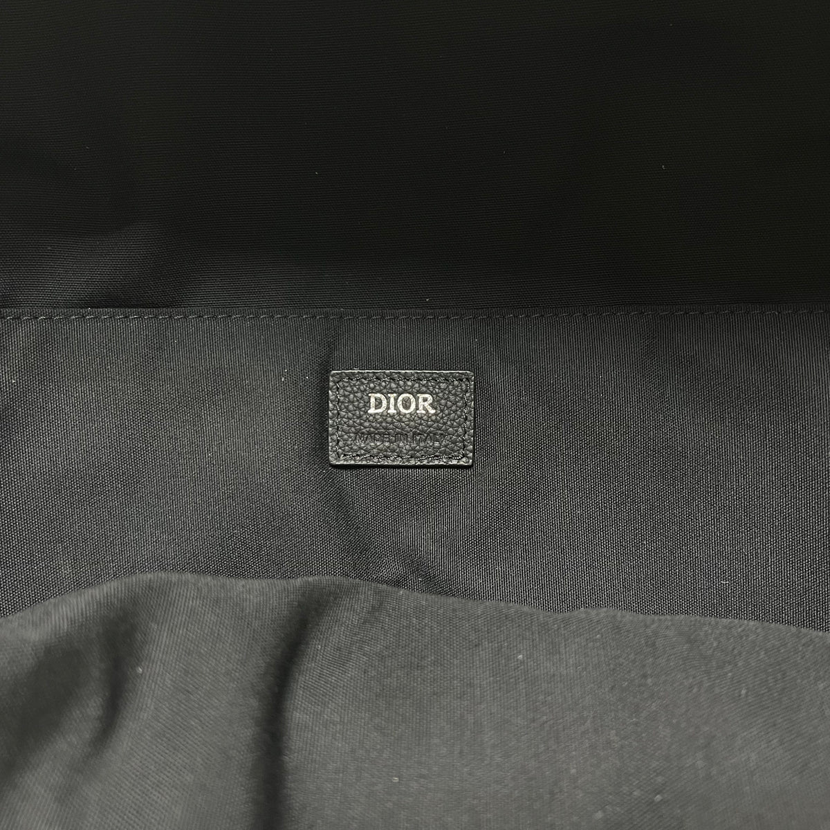 Bolsa azul y gris negra