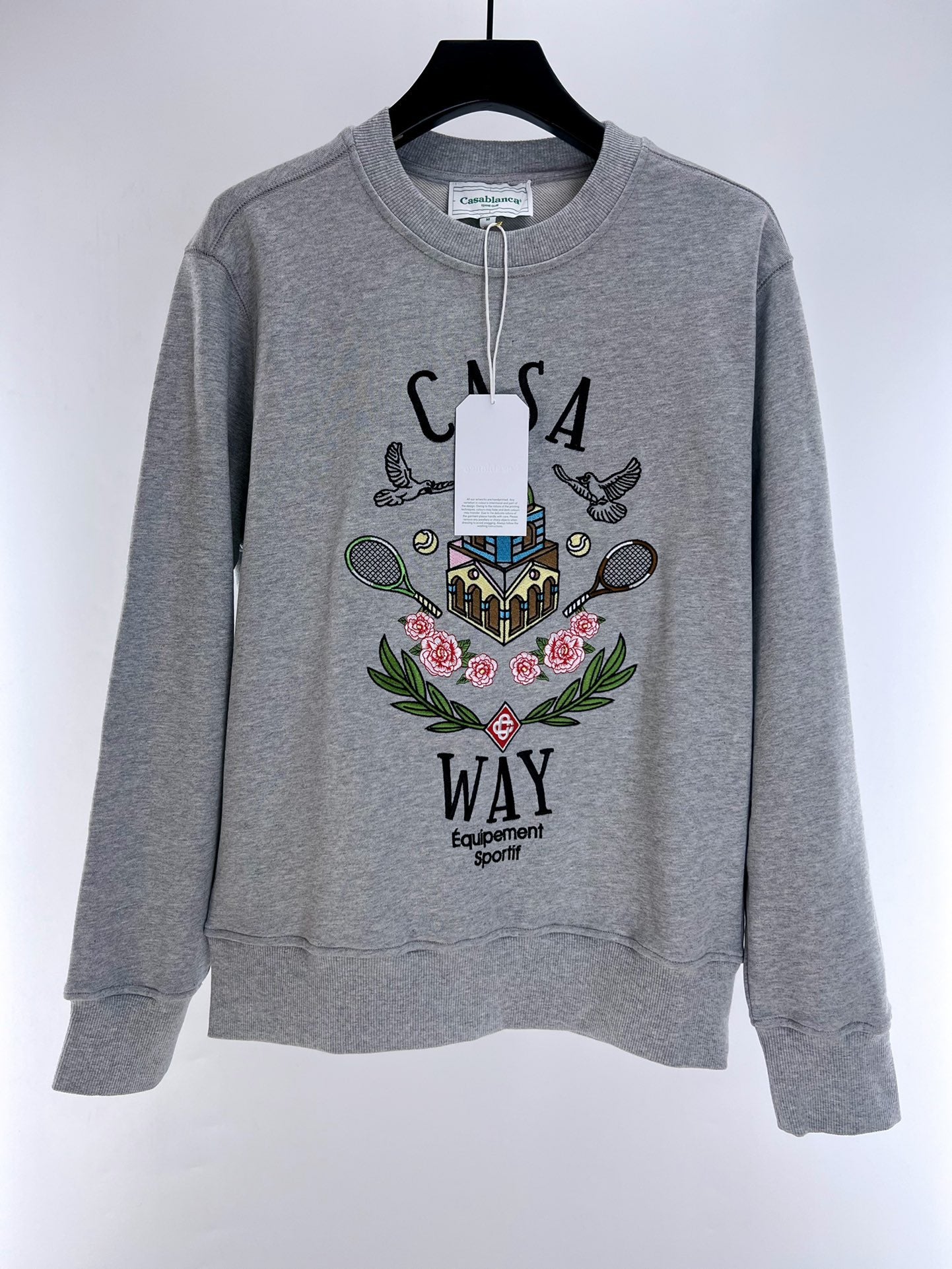 Sudadera blanca y gris