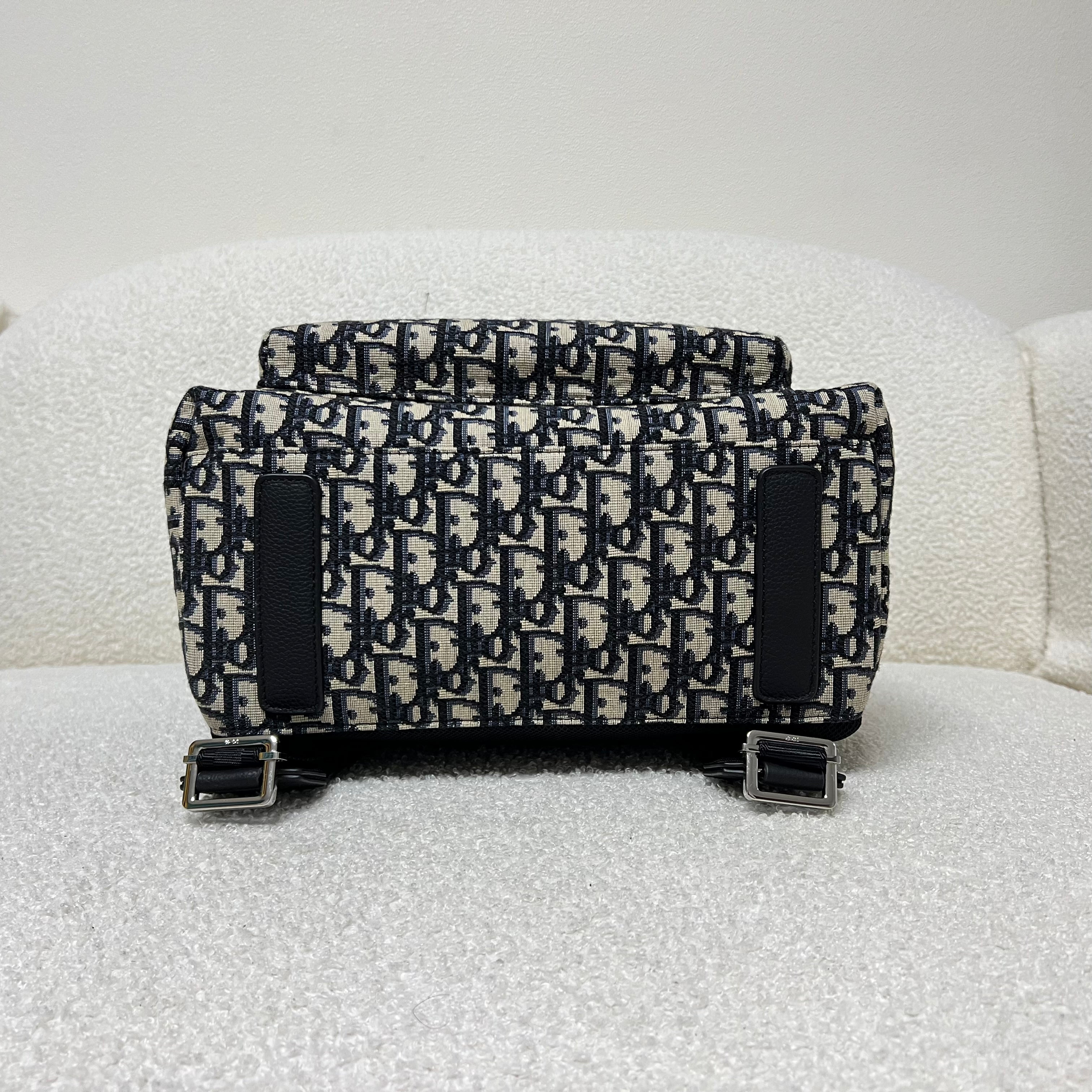 Bolsa azul y gris negra