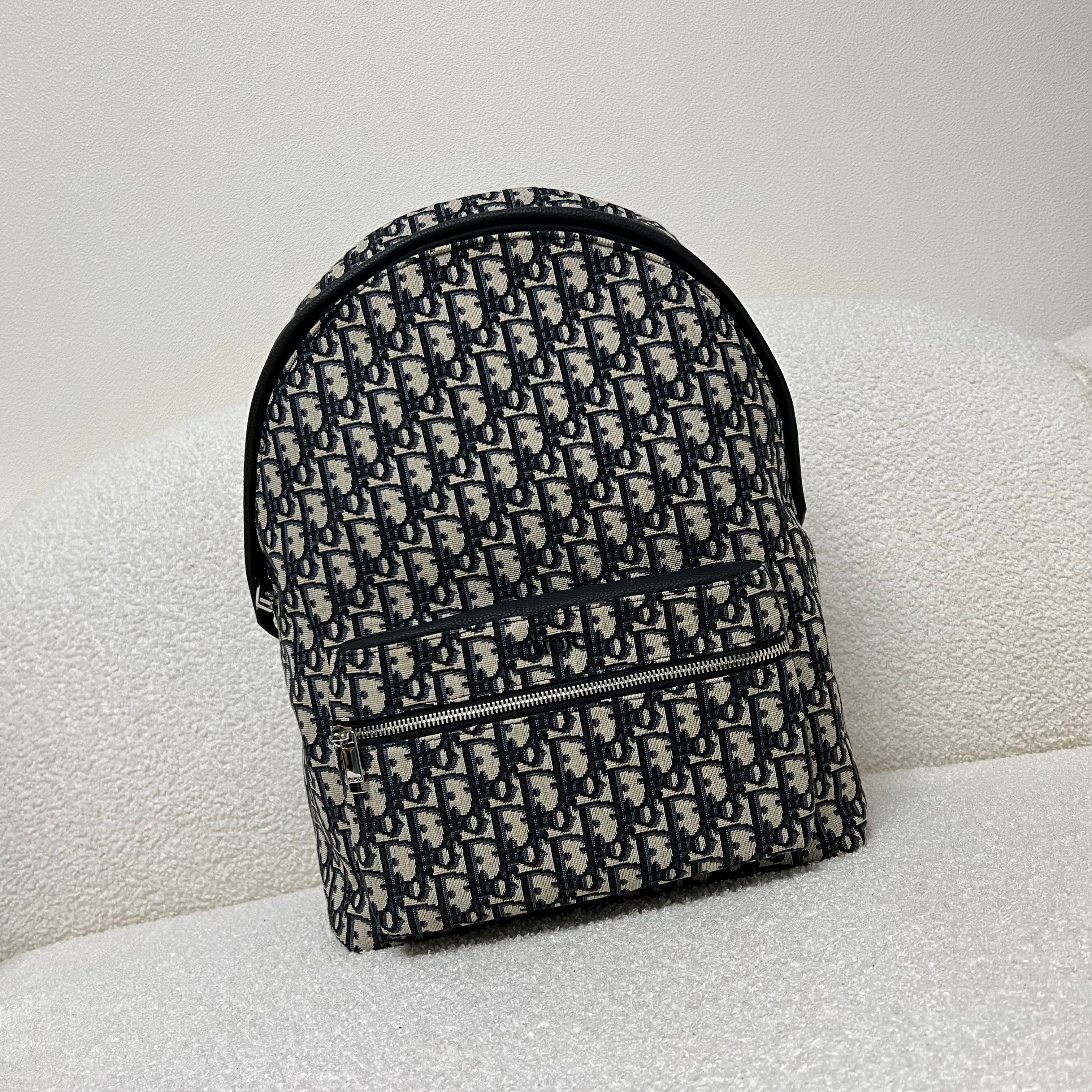 Bolsa azul y gris negra