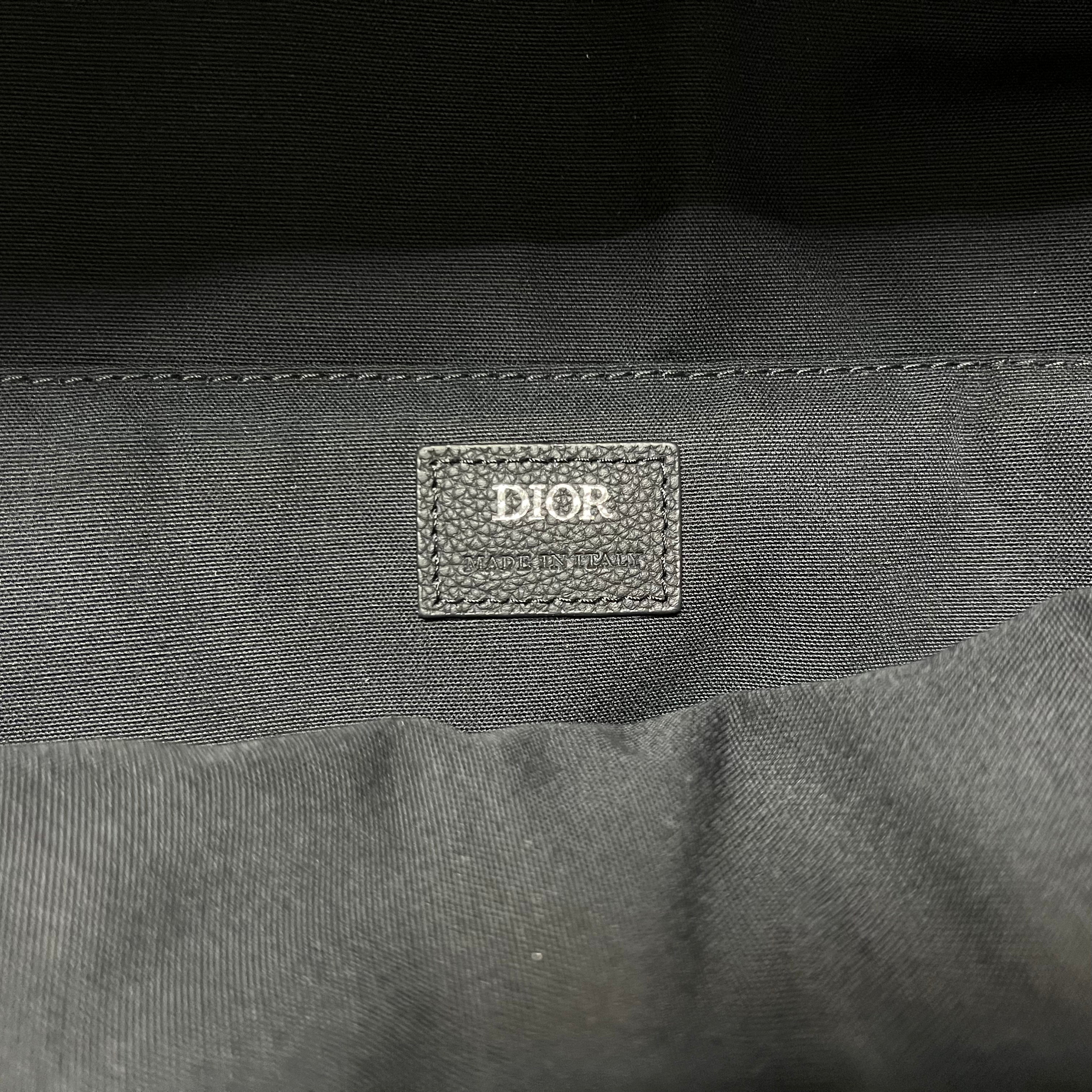 Bolsa azul y gris negra