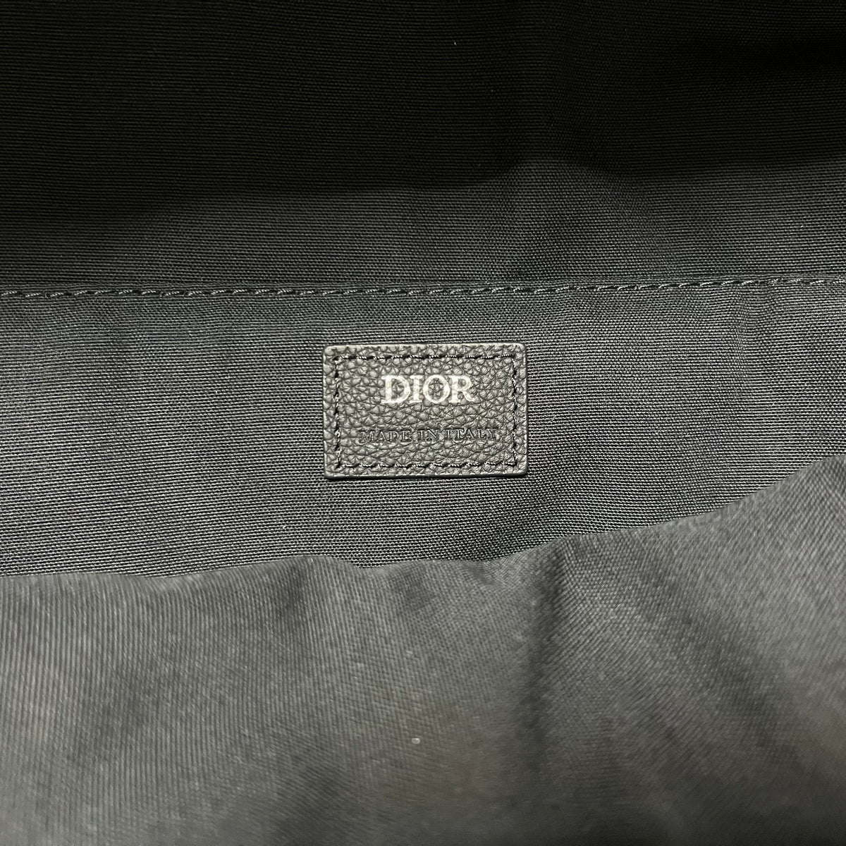 Bolsa azul y gris negra