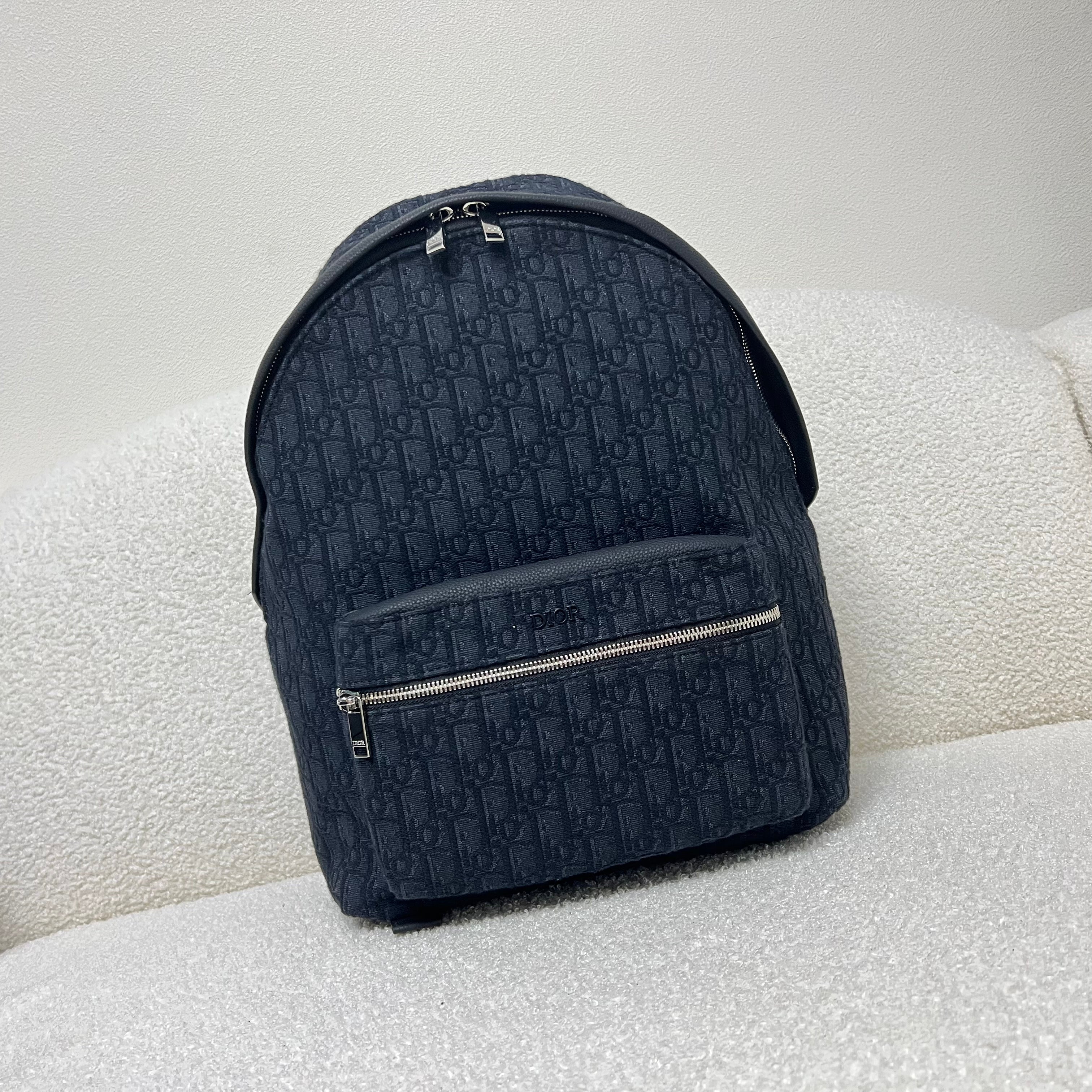 Bolsa azul y gris negra