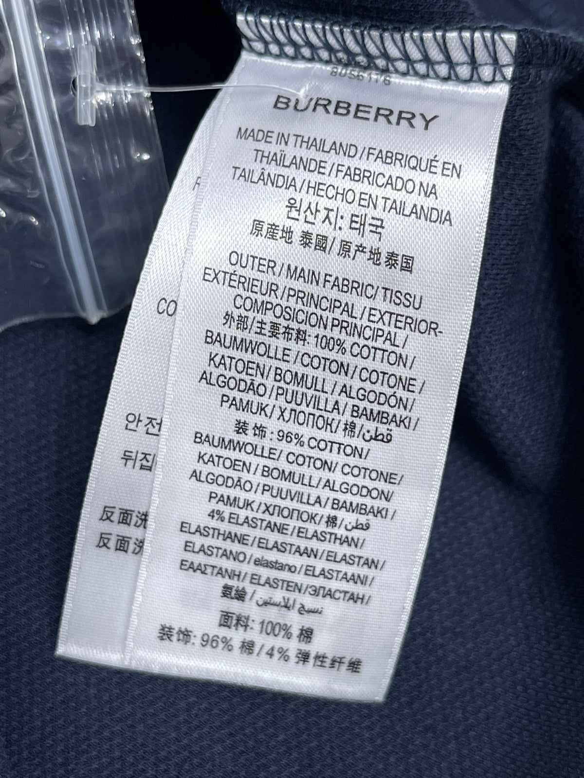 Poloshirt in Schwarz, Weiß, Marineblau und Hellblau