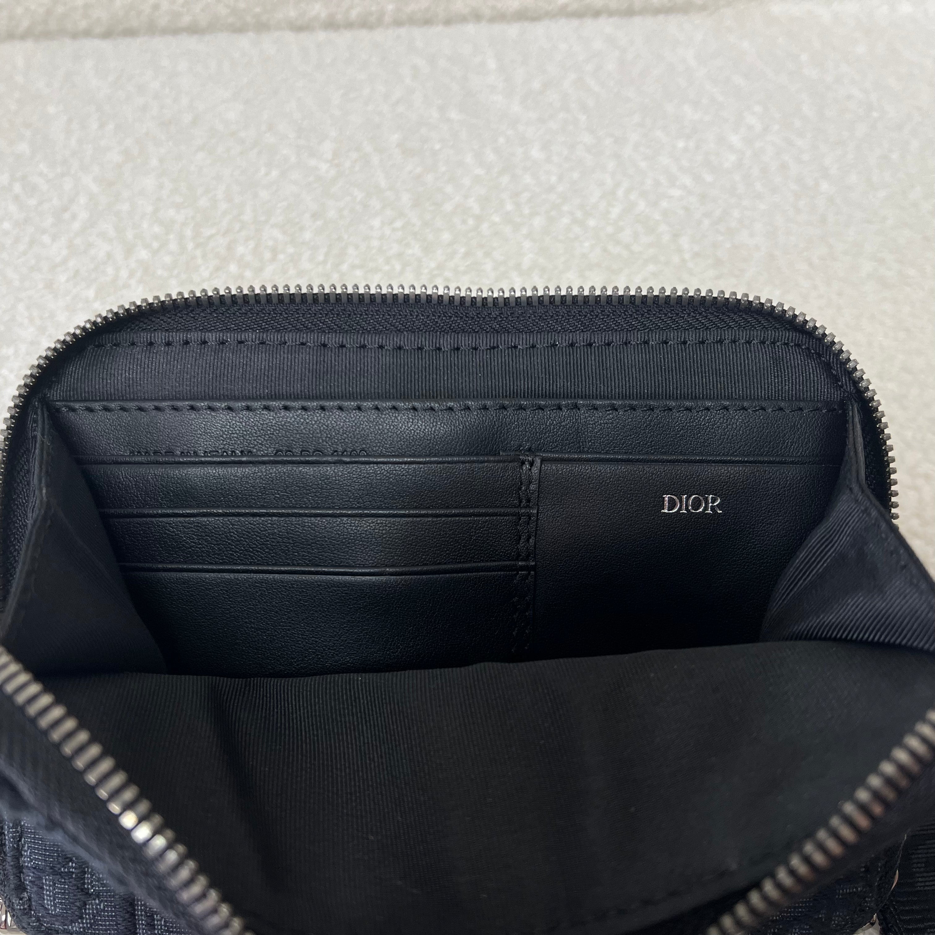 Bolsa azul y gris negra