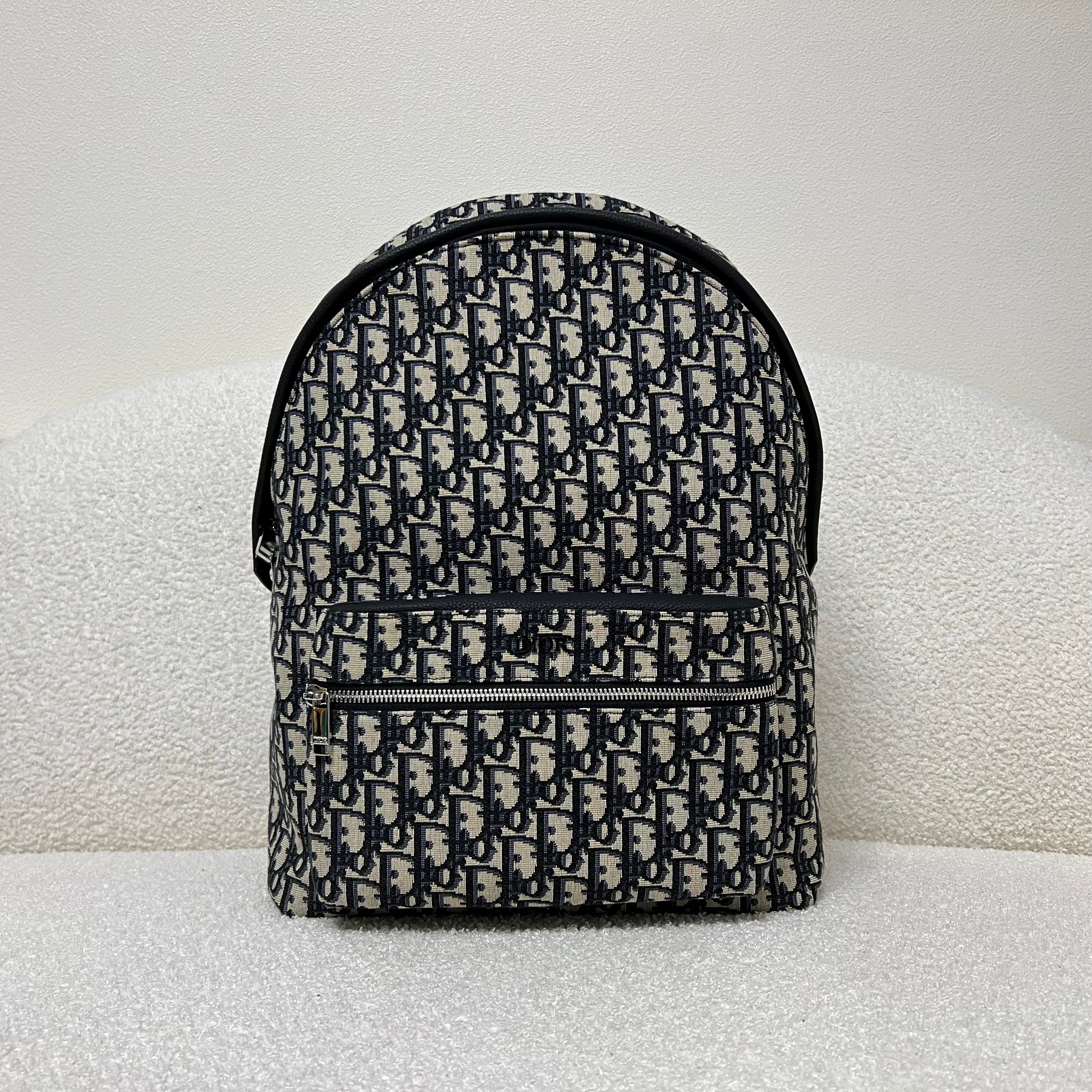 Bolsa azul y gris negra